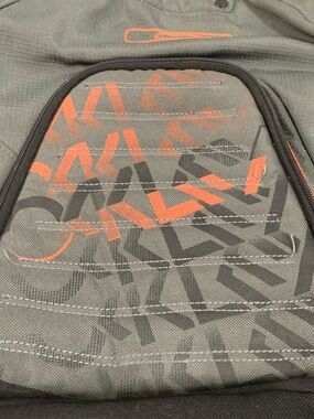 Oakley Gray and Orange Graphic Backpack